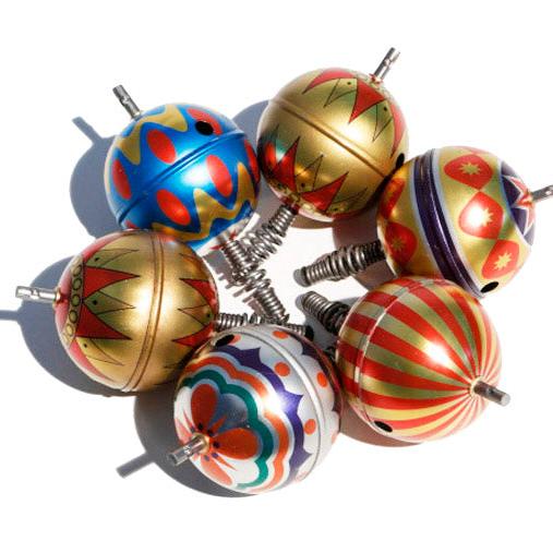 Bass & Bass – Peonza de Muelle Ornamentada