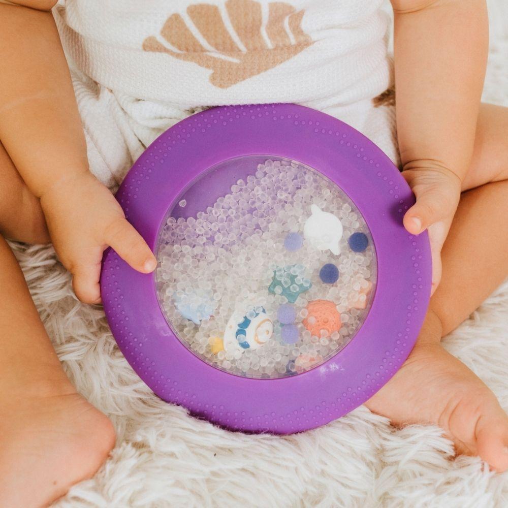 Bolsa Sensorial Peekaboo – Explorador Galáctico